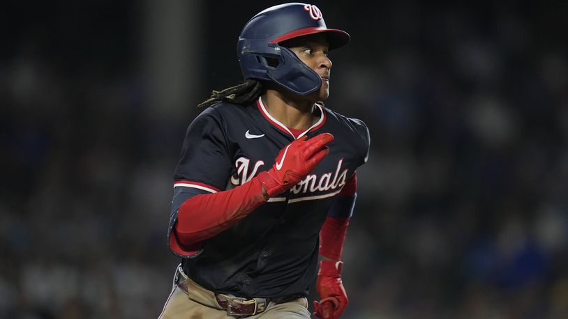 Washington Nationals' CJ Abrams runs the bases on a double during the third inning of a baseball game against the Chicago Cubs, Thursday, Sept. 19, 2024, in Chicago. (AP Photo/Erin Hooley)