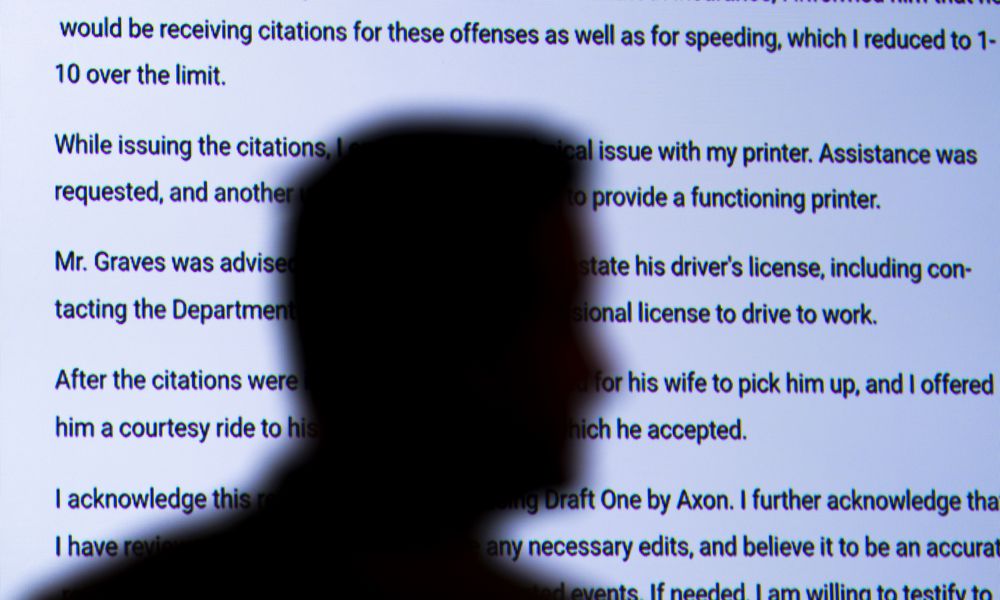 Captain Jason Bussert demonstrates Draft One, an AI powered software that creates police reports from body cam audio, at Oklahoma City police headquarters on Friday, May 31, 2024 in Oklahoma City, Oklahoma. (AP Photo/Nick Oxford)