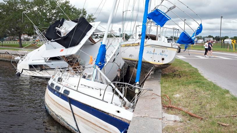 Boats destroyed during Hurricane Helene are shown on the Davis Islands Yacht Basin ahead of the possible arrival of Hurricane Milton Monday, Oct. 7, 2024, in Tampa, Fla. (AP Photo/Chris O'Meara)