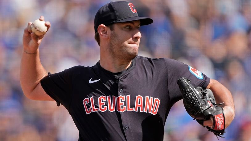 Cleveland Guardians starting pitcher Gavin Williams throws during the first inning of a baseball game against the Kansas City Royals Monday, Sept. 2, 2024, in Kansas City, Mo. (AP Photo/Charlie Riedel)