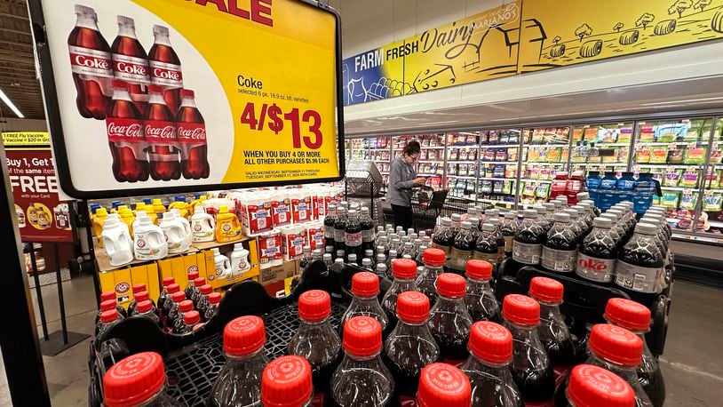 A customer passes an array of beverages while shopping at a grocery store in Chicago, Thursday, Sept. 19, 2024. (AP Photo/Nam Y. Huh)