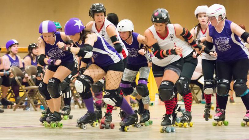 Gem City Rollergirls Demented Damsel, Hostile Hellion, Painbow Dash and Princess Troublegum during a match. (Source: Contributed)