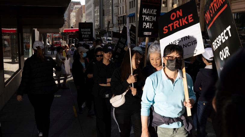 Hotel workers picket outside the Westin St. Francis Monday, Sept. 2, 2024, in San Francisco. (AP Photo/Benjamin Fanjoy)