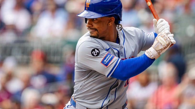 New York Mets' Francisco Lindor prepares to swing in the third inning of a baseball game against the Atlanta Braves, Monday, Sept. 30, 2024, in Atlanta. (AP Photo/Jason Allen)