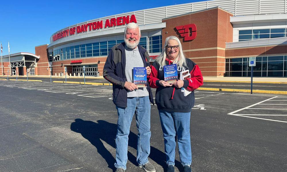 Kurt and Rita Rinehart show off copies of 