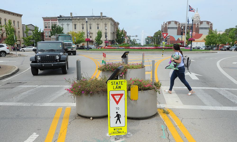 Troy officials are reexamining the crosswalks on the Public Square downtown to see if changes are warranted following complaints from residents concerned about safety. MARSHALL GORBY\STAFF