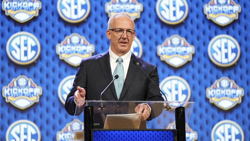 FILE - Southeastern Conference commissioner Greg Sankey speaks during SEC NCAA college football media days, July 15, 2024, in Dallas. (AP Photo/Jeffrey McWhorter, File)