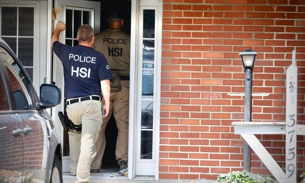 Homeland Security Investigations agents were outside a residence in the 3700 block of Waterbury Drive in Kettering as part of a federal investigation into allegations of financial crimes and labor exploitation. Search warrants were served at Fuyao Glass America and 27 other locations in the region on Friday, July 26, 2024, as part of the investigation. JIM NOELKER / STAFF