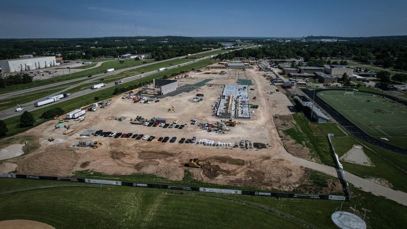 Work continues on West Carrollton school district's new middle/high school campus along Interstate 75. When completed in 2026, it will house seventh through 12th-grade students. JIM NOELKER/STAFF