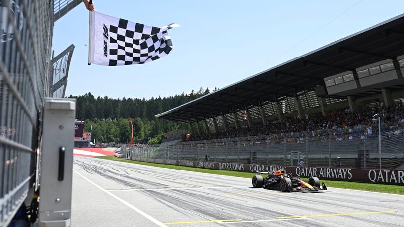 Red Bull driver Max Verstappen of the Netherlands crosses the finish line to win the sprint event at the Red Bull Ring racetrack in Spielberg, Austria, Saturday, June 29, 2024. The Austrian Formula One Grand Prix will be held on Sunday. (AP Photo/Christian Bruna, Pool)