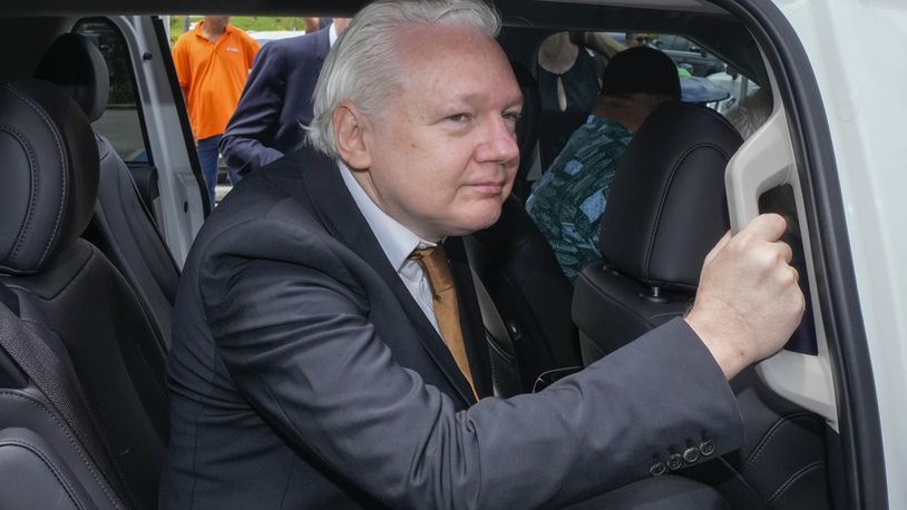 FILE - WikiLeaks founder Julian Assange leaves federal court in Saipan, Mariana Islands, June 26, 2024. (AP Photo/Eugene Hoshiko, File)