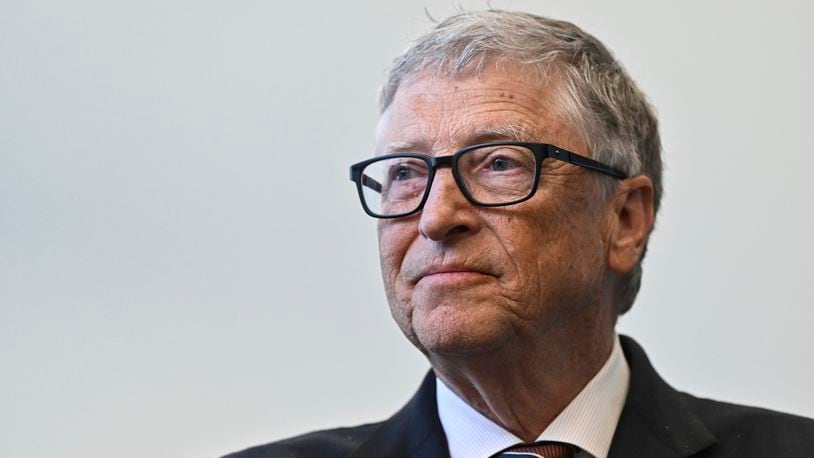 FILE - Bill Gates reacts during a visit with Britain's Prime Minister Rishi Sunak at the Imperial College University, in central London, Feb. 15, 2023. (Justin Tallis/Pool Photo via AP, File)