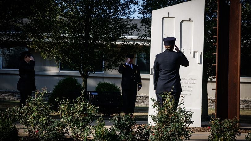 The Fairborn Honor Guard salute the 911 Memorial Wednesday September 11, 2024. The event was held at Calamityville were first responders and residence gathered. JIM NOELKER/STAFF