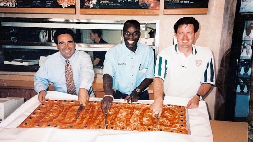 (L-R) Tony Capizzi, general manager, James A., Todd Rogers at the 1997 grand opening of the (now closed) Five Oaks Donatos location in Dayton.