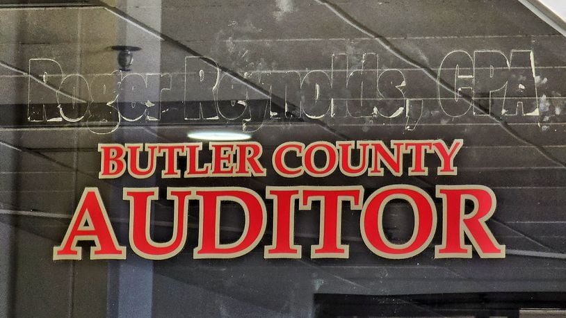 Roger Reynolds name was removed from the door of the Butler County Auditor's Office on High Street in Hamilton after he was convicted of a felony in December 2022. NICK GRAHAM/STAFF