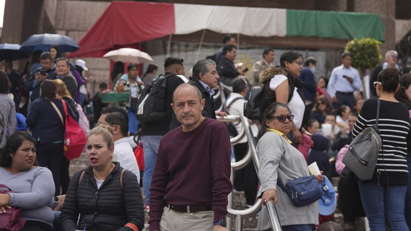 Unionized federal court workers gather outside a federal court as they strike over reforms that would make all judges stand for election in Mexico City, Monday, Aug. 19, 2024. (AP Photo/Fernando Llano)