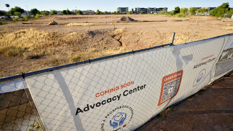 The lot of the future victims' advocacy center is shown, Wednesday, Sept. 4, 2024 in Gilbert, Ariz. The town has obligated only one-quarter of funds received through the American Rescue Plan for projects, according to the most recent data from the federal government. Construction on the dirt lot near its fire department for the advocacy center remain unrealized. (AP Photo/Matt York)