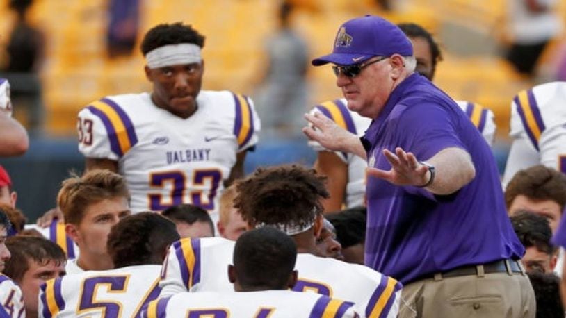 University of Albany football coach Greg Gattuso had a special surprise for four of his players last week.