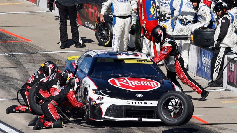 Christopher Bell (20) stops on pit road during a NASCAR Cup Series auto race at Kansas Speedway in Kansas City, Kan., Sunday, Sept. 29, 2024. (AP Photo/Colin E. Braley)