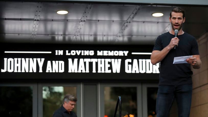 Columbus Blue Jackets player Boone Jenner speaks during the candlelight vigil to honor Columbus Blue Jackets hockey player Johnny Gaudreau, Thursday, Sept. 4, 2024, outside of Nationwide Arena in Columbus, Ohio. Gaudreau and his brother Matthew were killed by a motor vehicle last week while riding bicycles. (AP Photo/Joe Maiorana)