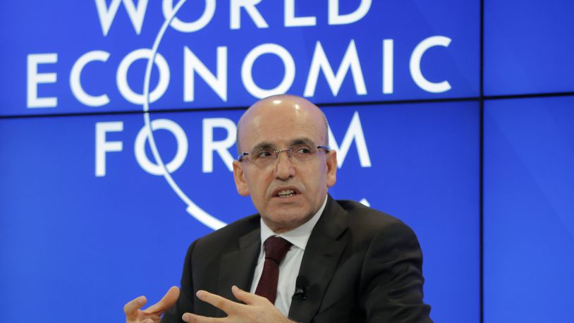 FILE - Turkish Finance Minister Mehmet Simsek speaks during a session of the World Economic Forum in Davos, Switzerland, Friday, Jan. 20, 2017. Turkey on Friday, June 28, 2024, welcomed a decision by an international watchdog to remove it from a so-called “gray list” of countries that have not fully implemented measures to fight money laundering and terrorism financing. “We succeeded,” Turkish Finance Minister Mehmet Simsek wrote on the social media platform X, as the decision was being announced. (AP Photo/Michel Euler, File)