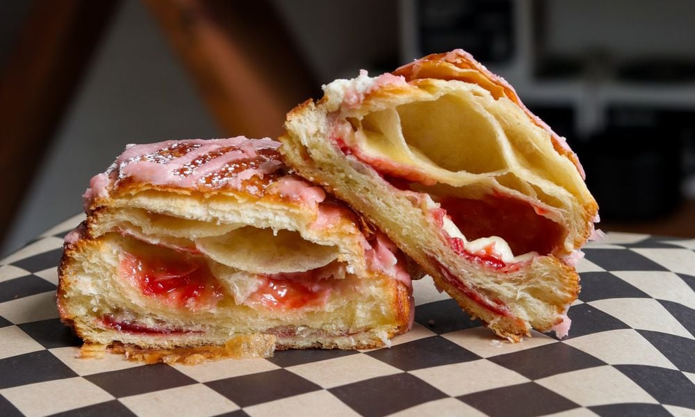 Pictured is the Strawberry Mascarpones Pain au Chocolat (strawberry white chocolate and mascarpone cream in a croissant with strawberry glaze and powdered sugar) at Val's Bakery in Dayton (CONTRIBUTED PHOTO).