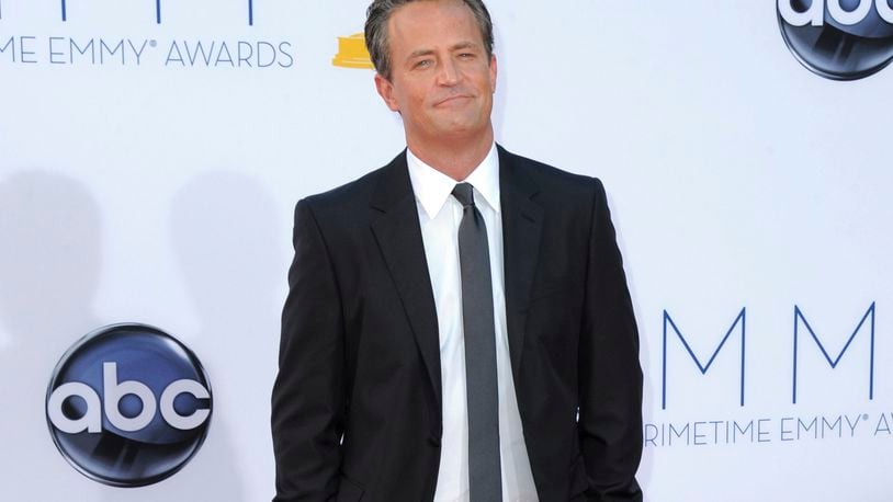 FILE - Actor Matthew Perry arrives at the 64th Primetime Emmy Awards in Los Angeles on Sept. 23, 2012. (Photo by Jordan Strauss/Invision/AP, File)