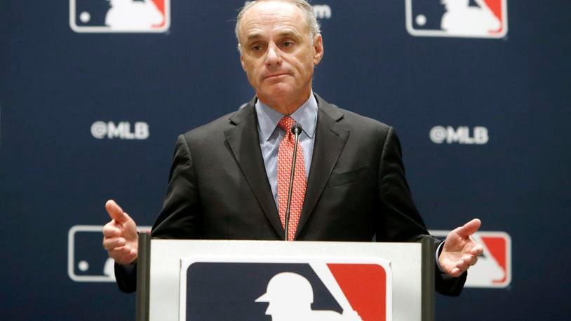 FILE - In this Nov. 21, 2019, file photo, baseball commissioner Rob Manfred speaks to the media at the owners meeting in Arlington, Texas. The chance that there will be no Major League Baseball season increased substantially Monday, June 15, 2020, when the commissioner's office told the players' association it will not proceed with a schedule amid the coronavirus pandemic unless the union waives its right to claim management violated a March agreement between the feuding sides.
