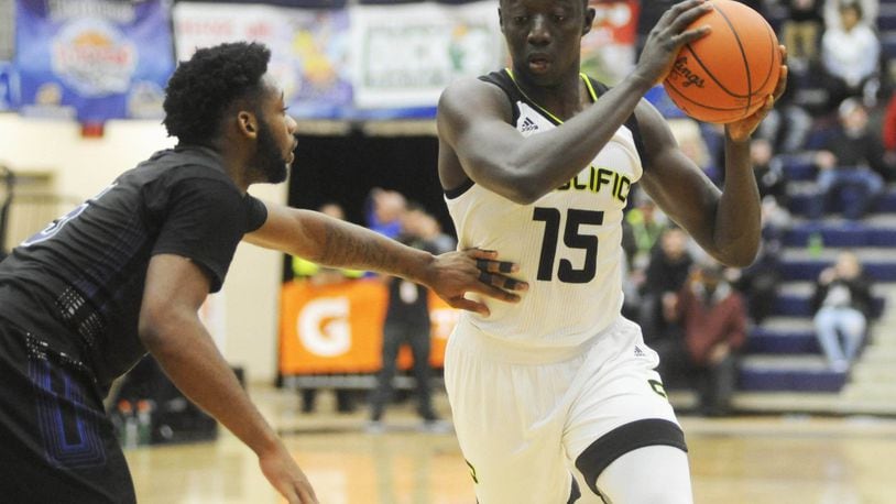 Prolific’s Alimamy Koroma (with ball). Prolific Prep (Calif.) defeated IMG Academy (Fla.) 75-71 in the 16th annual Premier Health Flyin’ to the Hoop at Trent Arena in Kettering on Sat., Jan. 13, 2018. MARC PENDLETON / STAFF