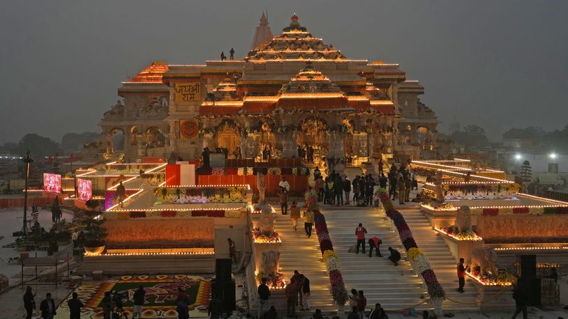 FILE - Workers decorate a temple dedicated to Hindu deity Lord Ram with flowers the day before the temple's grand opening in Ayodhya, India, Sunday, Jan. 21, 2024. (AP Photo/Rajesh Kumar Singh, File)