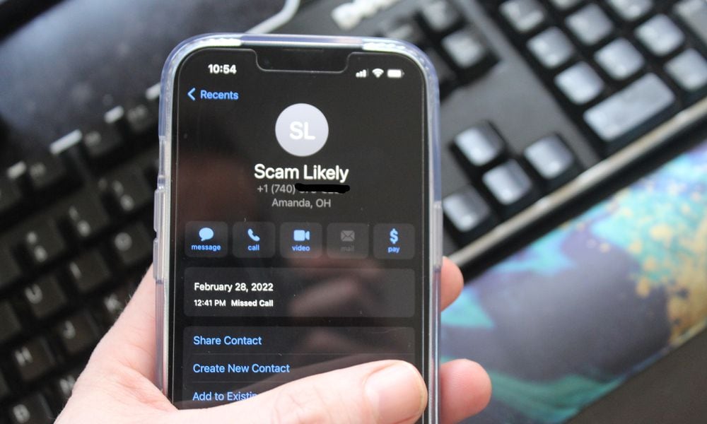 Smart phones sometimes give notice that a call might be from a scammer. CORNELIUS FROLIK / STAFF