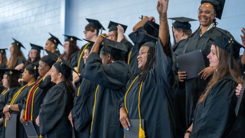 Dayton Correctional Institute women celebrate after getting their diplomas Tuesday, Oct. 1. Courtesy of Sinclair Community College