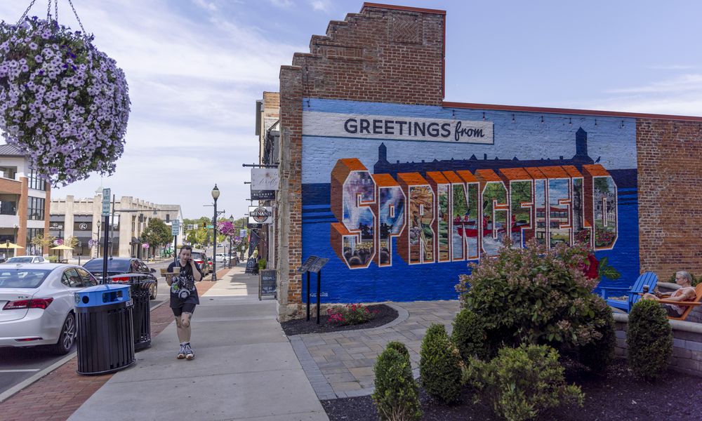  FILE A Greetings from Springfield mural in Springfield, Ohio, on Aug. 27, 2024. In Springfield, threats leave Haitian residents shaken; tension hangs over the city after a week of closings and lockdowns, and the strain of recent months has led some Haitian immigrants to consider moving to bigger cities. (Maddie McGarvey/The New York Times) 