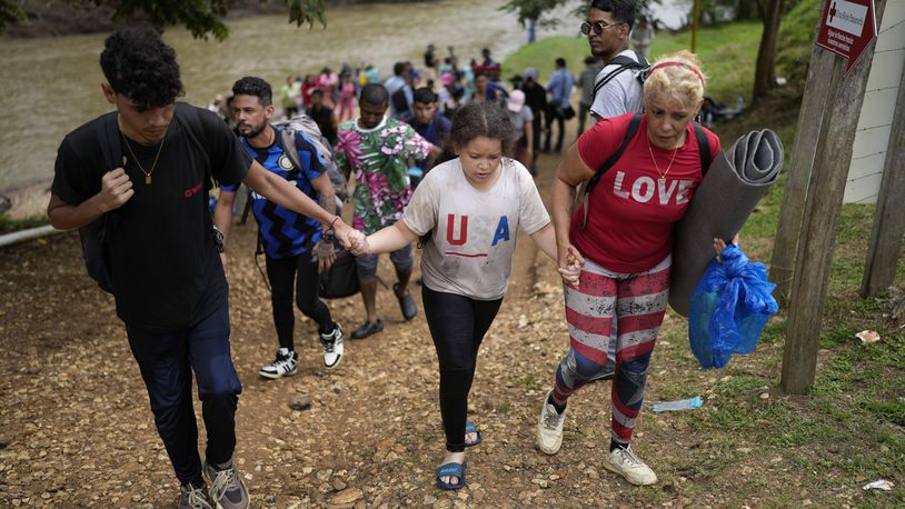 Migrants arrive to Lajas Blancas, Panama, after trekking across the Darien Gap from Colombia in hopes of reaching the U.S., Thursday, Sept. 26, 2024. (AP Photo/Matias Delacroix)