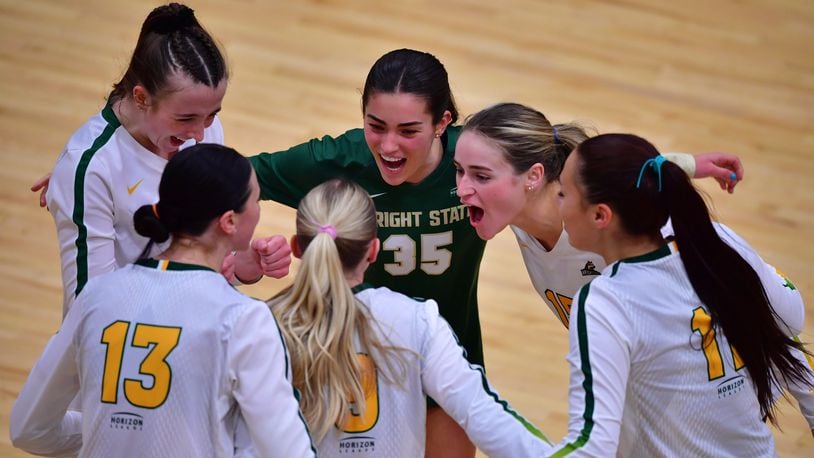 Wright State players celebrate a winning point against Green Bay in the Horizon League championship match at McLin Gymnasium on Nov. 19, 2023. Wright State Athletics photo