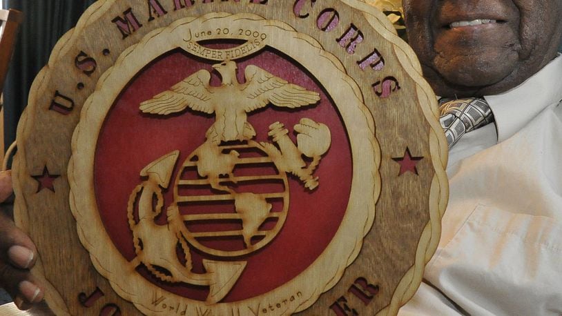 Jonas Bender, of Yellow Springs, received one of the nation’s highest honors, the Congressional Gold Medal in 2012. At the time, Bender was one of 400 remaining Montford Point Marines, who broke the corps’ color barrier during World War II. BILL LACKEY/STAFF