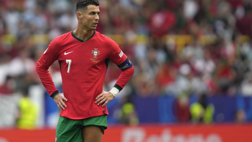 Portugal's Cristiano Ronaldo reacts during a Group F match between Turkey and Portugal at the Euro 2024 soccer tournament in Dortmund, Germany, Saturday, June 22, 2024. (AP Photo/Darko Vojinovic)