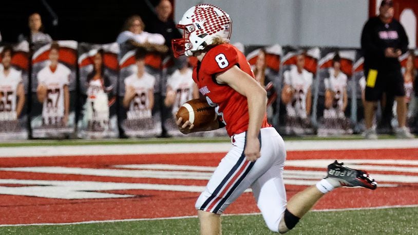 Tipp's Carson Robbins carries the ball in for a touchdown after picking up a Trotwood fumble during the Friday, Nov. 4, 2022, game. BILL LACKEY/STAFF