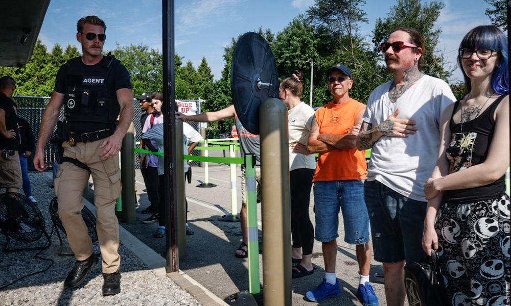 Marijuana fans line-up to enter Pure Ohio on Needmore Road in Harrison Twp. Tuesday the first day of recreation marijuana sales. Jim Noelker/Staff