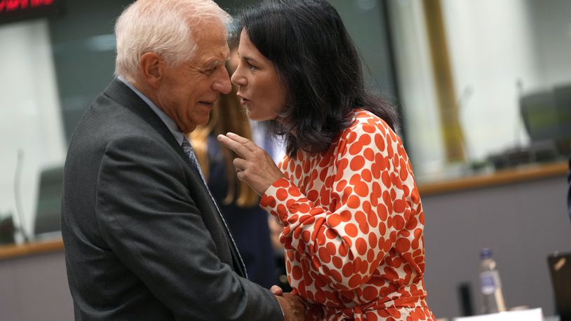 Germany's Foreign Minister Annalena Baerbock, right, speaks with European Union foreign policy chief Josep Borrell during a meeting of EU foreign ministers at the European Council building in Brussels, Thursday, Aug. 29, 2024. (AP Photo/Virginia Mayo)