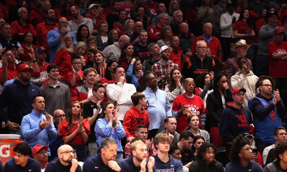 Dayton fans cheer during a game against Virginia Commonwealth on Friday, March 8, 2024, at UD Arena. David Jablonski/Staff