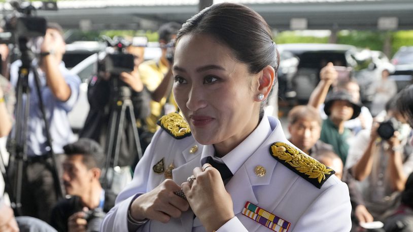 Thailand newly elected Prime Minister Paetongtarn Shinawatra arrives before the royal endorsement ceremony appointing Paetongtarn as Thailand's new prime minister at Pheu Thai party headquarters in Bangkok, Thailand, Sunday, Aug. 18, 2024. (AP Photo/Sakchai Lalit)