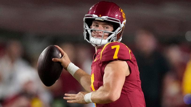 Southern California quarterback Miller Moss passes during the first half of an NCAA college football game against Utah State, Saturday, Sept. 7, 2024, in Los Angeles. (AP Photo/Mark J. Terrill)