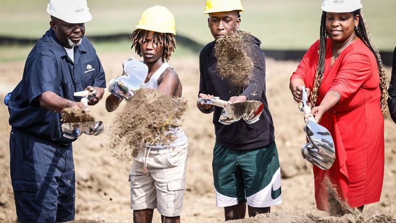 From left, Jefferson Twp. building and grounds supervisor Rod Dixon, Jefferson High students Christian Colling and Danial Kana and Jefferson Twp. board president Shaunece Gillespie break ground on the new agriculture center Tuesday morning June 25. 2024. JIM NOELKER/STAFF