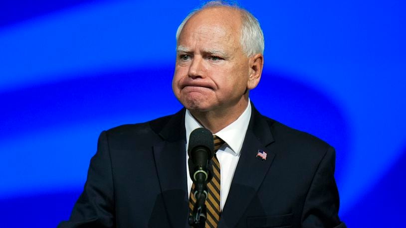 Democratic vice presidential nominee Minnesota Gov. Tim Walz reacts as he speaks at the American Federation of State, County and Municipal Employees (AFSCME) Convention in Los Angeles, Tuesday, Aug. 13, 2024. (AP Photo/Jae C. Hong)