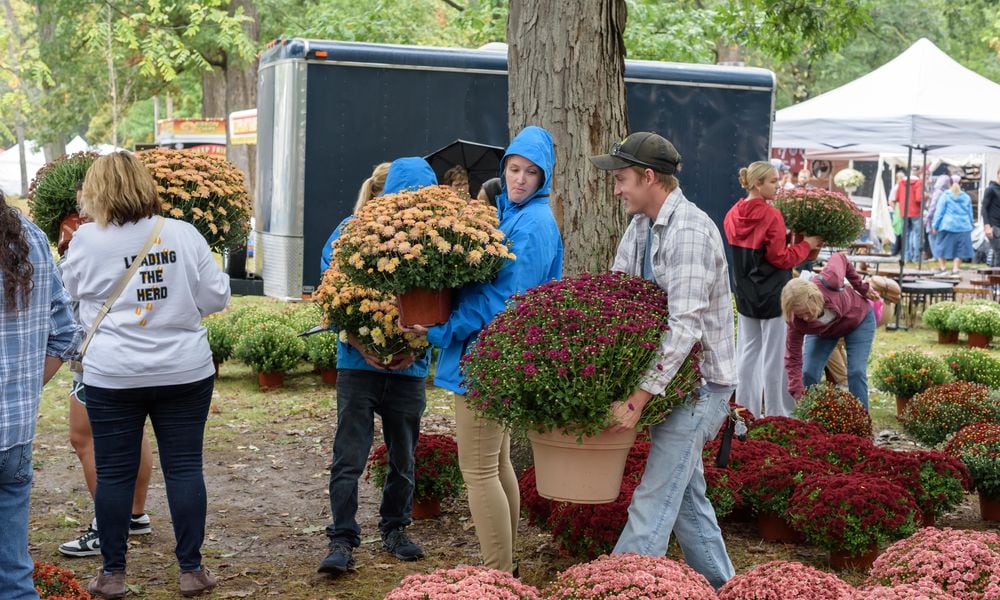 The 65th annual Tipp City Mum Festival happened on Saturday, Sept. 28 and Sunday, Sept. 29, 2024, at City Park. This yearâs festival theme was Tippecanoe & Mum Fest Too. Hereâs a look at the downtown parade and festival on Saturday. TOM GILLIAM / CONTRIBUTING PHOTOGRAPHER