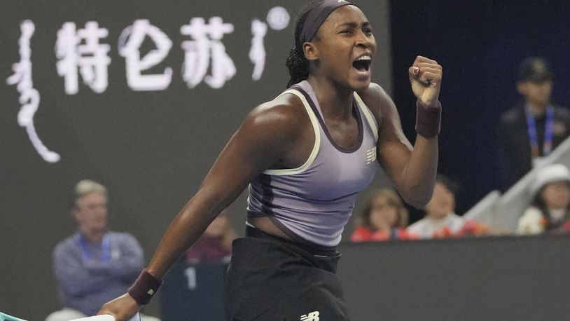 Coco Gauff of the United States reacts during her women's singles final match against Karolina Muchova of Czech Republic at the China Open tennis tournament at the National Tennis Center in Beijing, Sunday, Oct. 6, 2024. (AP Photo/Achmad Ibrahim)