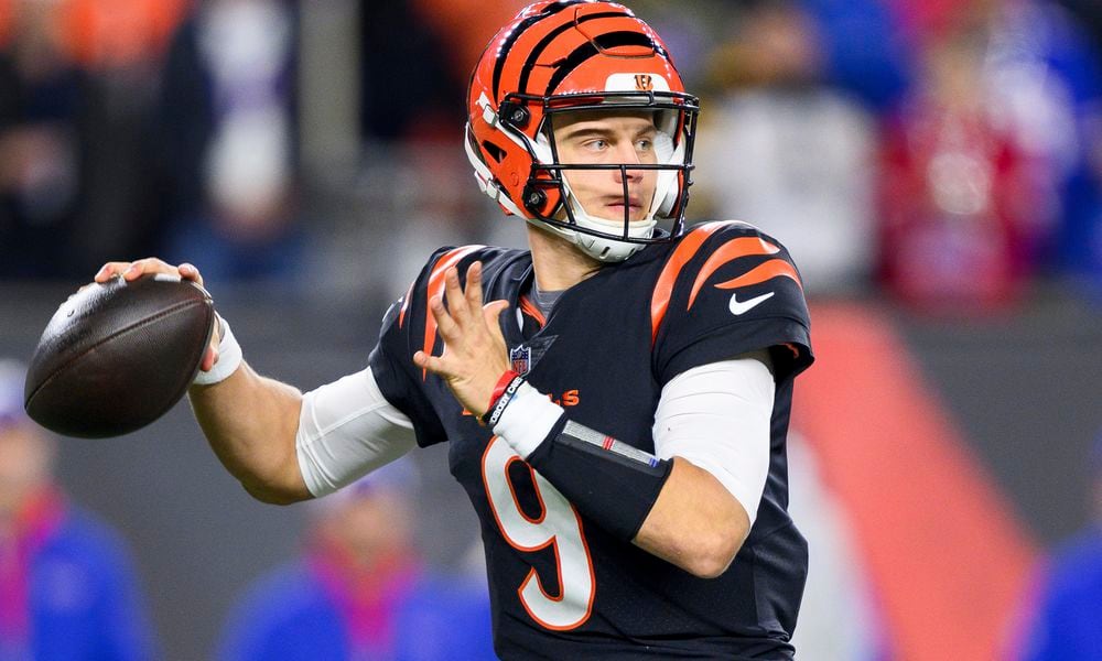 FILE - FILE - Cincinnati Bengals quarterback Joe Burrow (9) throws downfield during an NFL football game against the Buffalo Bills, Sunday, Nov. 5, 2023, in Cincinnati. (AP Photo/Zach Bolinger, File)