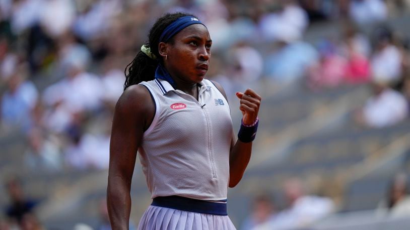Coco Gauff of the U.S. clenches her fist after scoring a point against Tunisia's Ons Jabeur during their quarterfinal match of the French Open tennis tournament at the Roland Garros stadium in Paris, Tuesday, June 4, 2024. (AP Photo/Thibault Camus)