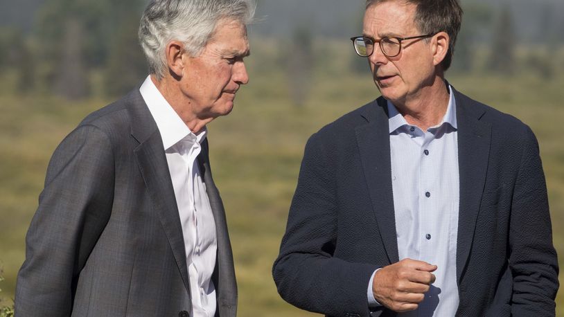 Federal Reserve Chairman Jerome Powell, left, speaks with Governor of the Bank of Canada Tiff Macklem outside of the Jackson Hole Economic Symposium at Jackson Lake Lodge in Grand Teton National Park near Moran, Wyo., on Aug. 23, 2024. (AP Photo/Amber Baesler)